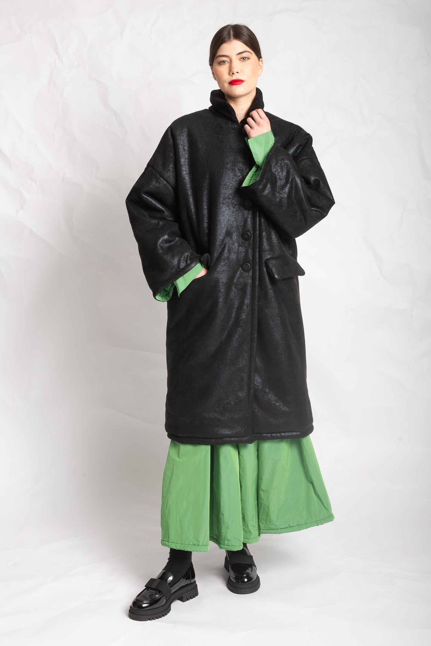 Les Filles D'ailleurs Black Coat With Striking Green LIner.