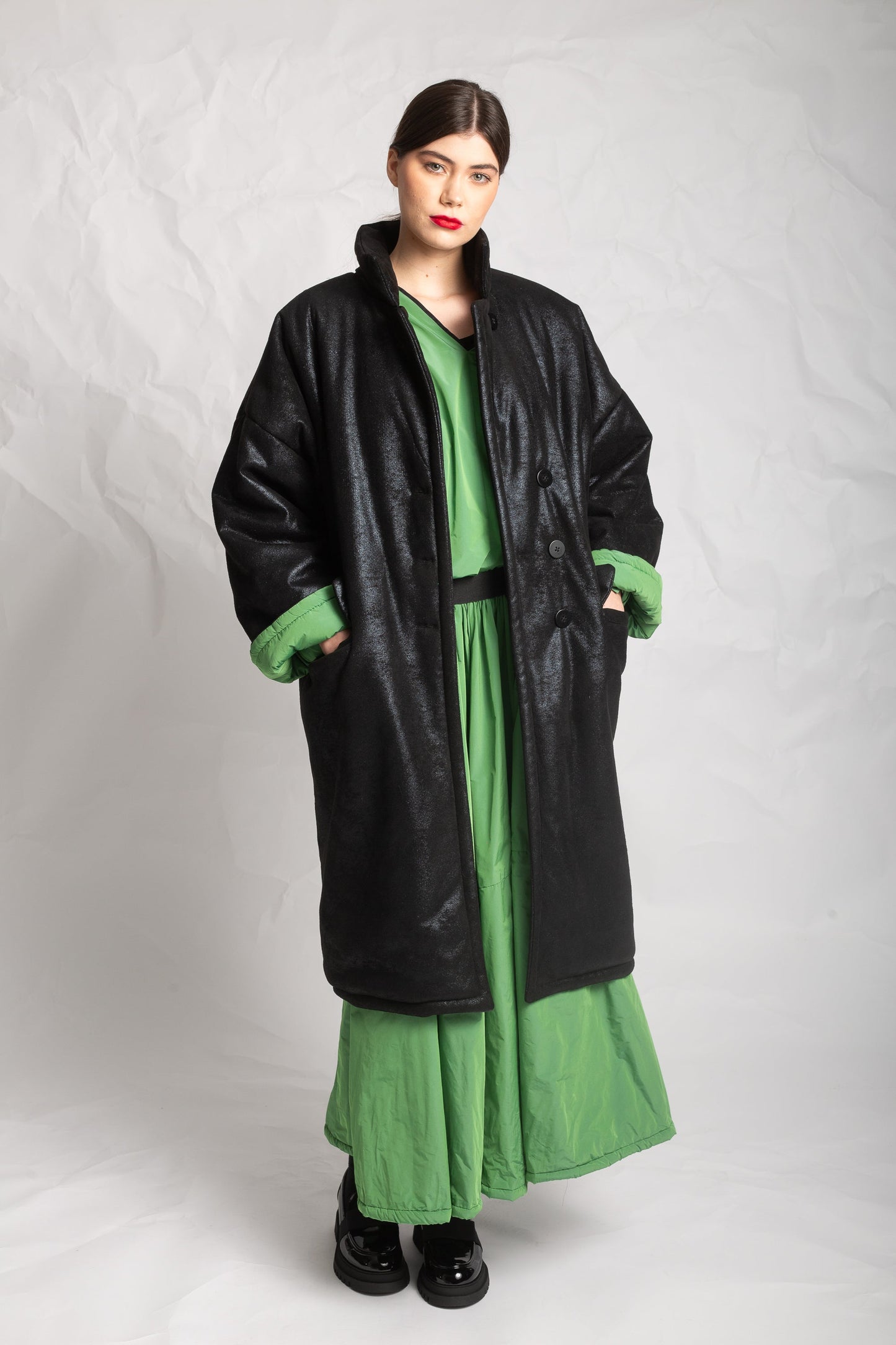 Les Filles D'ailleurs Black Coat With Striking Green LIner.